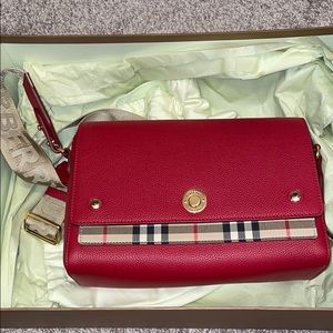 Burberry purse (new) never worn with tags
